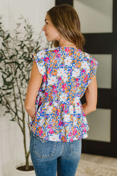 PREORDER: Sleeveless Bow Blouse in Pink and Orange Floral